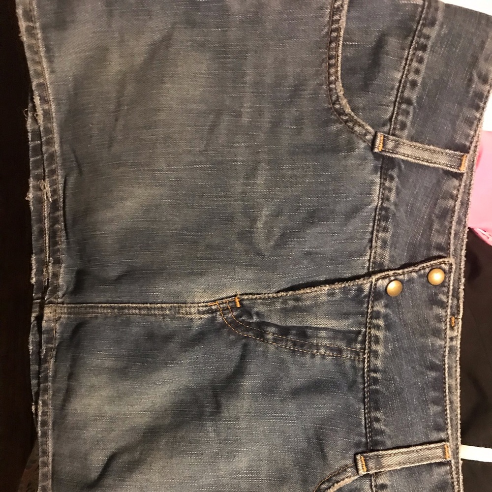 Denim skirt semi distressed.